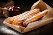 © InfiniteStudio - Traditional Spanish dessert churros with puffed sugar, churros close-up, fresh hot sticks in a paper bag