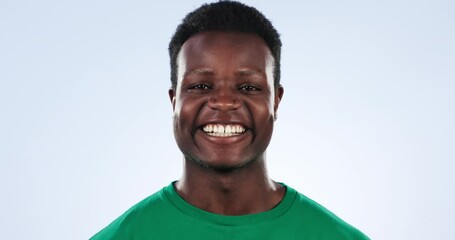 Poster - Volunteer face, phone and happy black man typing charity research, community service blog or waste management info. Studio smartphone, portrait or activist check Earth Day news on blue background