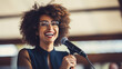 © Tierney - Happy african american businesswoman giving a speech at conference