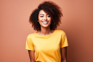 Poster - Woman with yellow shirt smiling at the camera with pink background.