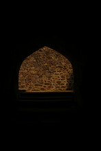 Arabic Window With Ancient Stone Wall With Background In The Dark, Close-up Of A Window