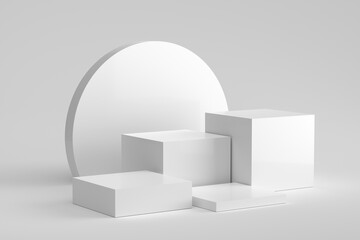 Wall Mural - White cube and circle shaped podiums or pedestals on white background.