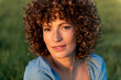 © Westend61 - Beautiful woman with curly hair