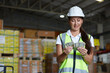 © offsuperphoto - factory worker counting money in the warehouse storage
