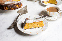 Slice Of Gluten Free Orange Cake And Cup Of Coffee