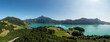 Austria, Upper Austria, Drone panorama of Mondsee lake and surrounding mountains in summer