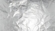 © Prasanth - Seamless silver leaf background texture transparent overlay. Shiny light grey crumpled metallic chrome foil repeat pattern. Modern abstract luxury wallpaper. Glittery party backdrop.