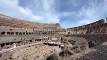 From Inside The Colosseum, The Camera Gazes Out Over The Remnants Of The Ancient Stage