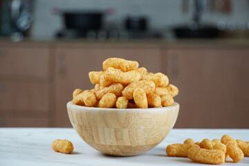 Israeli famous snack Bamba - made of peanut butter. Peanut Flips or peanut puffs