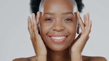 Wall Mural - Face touch, skincare and happy black woman in studio isolated on a gray background for dermatology. Portrait, hands and natural beauty cosmetics of model in spa facial treatment, wellness and health