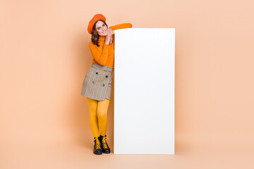 Sticker - Full length portrait of lovely cute person big empty space telephone display isolated on beige color background