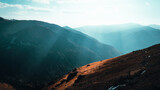 Fototapeta Na ścianę - Góry w promieniach słońca