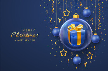 Sticker - Merry christmas greeting card. Gift box with golden bow in a glass bauble. Christmas blue background with hanging gold stars and balls. Holiday Xmas, New Year banner, flyer. Vector Illustration.