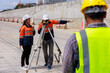 © SHUTTER DIN - engineer use theodolite equipment working on construction site for route surveying