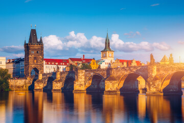 Wall Mural - Old town of Prague. Czech Republic over river Vltava with Charles Bridge on skyline. Prague panorama landscape view with red roofs.  Prague view from Petrin Hill, Prague, Czechia.