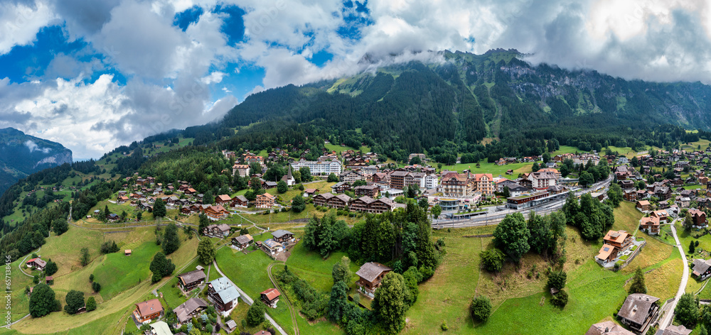 Townscape of village of Wengen on the edge of Lauterbrunnen Valley. Traditional local houses in Wengen village in the Interlaken district in the Bern canton of Switzerland.