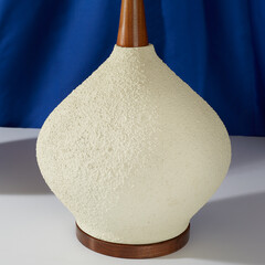 Vintage stylish white lamp. Interior product photograph with a blue background.