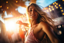 Portrait Of Happy Beautiful Young Woman With Long Straight Blonde Hair In Dance Movement At Beach Disco Bar. Summer Vacation, Holiday, Happiness, Best Tropical Beach Party Chill Out Music Concept