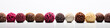 Closeup of typical brazilian brigadeiros, various candy flavors on white background