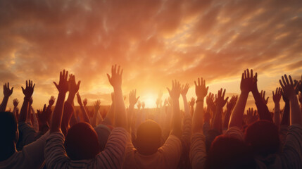 Poster - Hands silhouettes of a crowd raised up to worship God against a sunset sky