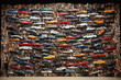 A collage of a car made of thousands of car.