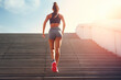 Woman running up the stairs, interval training.