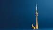 a miniature CN Tower infront of isolated Navy blue and gold contrast on left side with copy space.