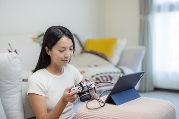 Sticker - Woman use camera to connect with the tablet computer at home