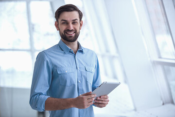 Wall Mural - Handsome businessman in office