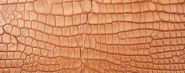 Wall Mural - Closeup of crocodile skin leather in a light tan color with muted, earthy undertones. The leather is smooth to the touch and has a luxurious, exotic look.