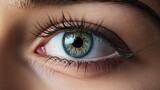 Fototapeta  - Extreme macro close up of a blue eye of a girl