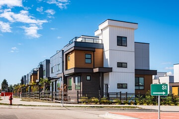 Wall Mural - New Modern Apartment Buildings in Vancouver BC. Canadian modern residential architecture. New townhouses on a sunny day