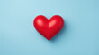 © vefimov - Red heart on blue background. Suitable for use in love-themed designs and Valentine's Day projects.