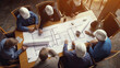 © PaulShlykov - Top view of group of engineering team is meeting, planning construction work, Architects looking paper plans at construction site, overhead view,Concept for team work