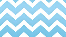 A Blue And White Chevroned Pattern With A Light Blue Waves