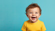 © AdriFerrer - Happy baby on blue background