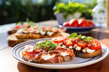 Sticker - close-up of an open-face prosciutto sandwich and caprese salad