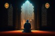 back view muslim man praying in a mosque