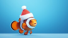 Cartoon Red Sea Clownfish With Santa Hat On A Blue Background. Close Up, Copy Space.