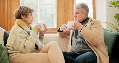 Sticker - Senior couple, talking and relax in home with coffee, drink or conversation in morning together in retirement. Old people, speaking and drinking tea, espresso or cappuccino on sofa in living room