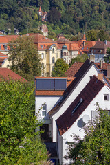 Poster - solar panel on rooftops in a historical city