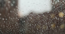 Raindrops On Windowpane During A Rainy Day, Capturing The Tranquility And Melancholy Of Nature's Tears, Evoking Reflection And Emotional Depth