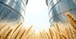 Agro silos granary elevator with seeds cleaning line on agro-processing manufacturing plant in wheat field. Storage of agricultural production.