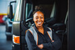 © VisualProduction - Portrait of beautiful young woman professional truck driver. smiling young woman driver in a truck. Female sitting on driving seat of a truck