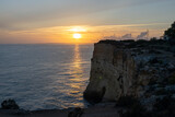 Fototapeta  - Southern coast of Portugal, cliff, sunset