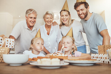 Poster - Parents, grandparents and children with candles on birthday cake for celebration with family, love and sweets in home. Happiness, men and women together at table at girl kids party event in apartment