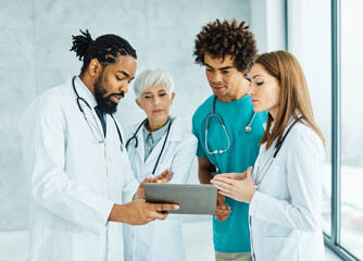 Wall Mural - doctor hospital team medical document health medicine healthcare meeting teamwork tablet computer technology clinic office hallway