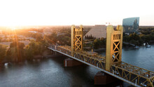 Sunset View Of The Historic 1935 Tower Bridge And The Downtown Skyline Of Old Sacramento, California, USA.