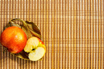 Apples on straw mat background modern medicine apple a day fruit organic decoration