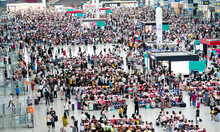 Large Group Of People Waiting At Train Station Hall
